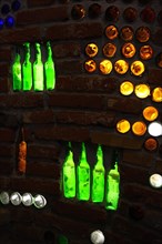 Light elements from old bottle glass