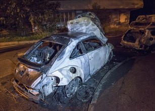 Burnt out VW Beetle after accident