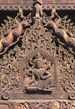 Teak-wood carvings at Nat Taung Kyaung