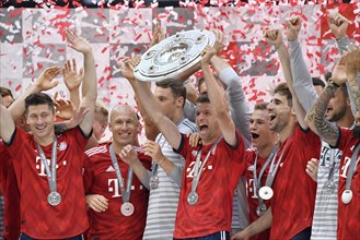 Cheering Thomas Muller FC Bayern Munich after handing over the championship cup