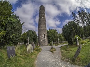 Round tower and cemetery at Glendalough Monastery