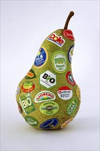 Pear with many stickers