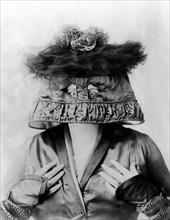 Woman with lampshade on her head