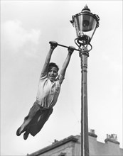 Boy swings to Lantern