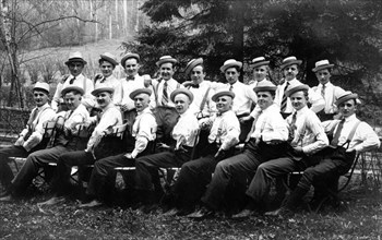 Male club with suspenders and shirt ca. 1925