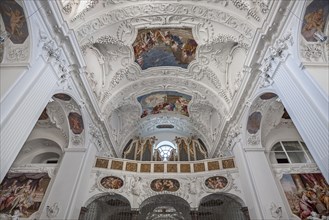 Interior view with organ gallery and ceiling frescoes and stucco