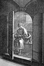 Student sitting on toilet