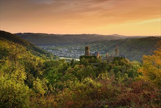 View of Thurant Castle in the Moselle Valley at sunset in autumn