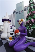 Sculptures of comic figures in front of the MBK Center