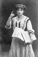 Woman with raised index finger
