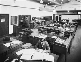Women and men at work in the open-plan office