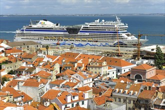 View from Miradouro das Portas do Sol on river Tejo with docked cruise ship