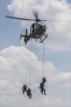 Special unit of police in exercise with helicopter