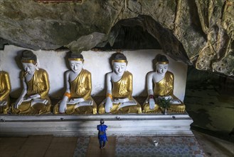 Buddha statues in the Kawgun Cave