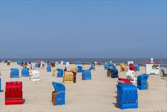 Sandy beach with beach chairs at the North Sea