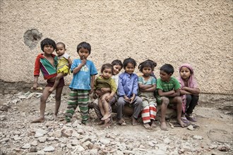 Group of small children in the slum at the Ghazipur garbage dump