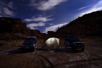 Night camp of two four-wheel drive vehicles