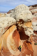 Hiker in White Pocket Canyon
