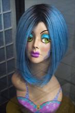 Head of a mannequin with blue wig