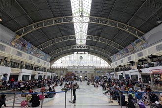 Waiting passengers in the historic station concourse from 1916