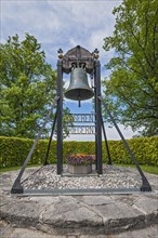 War memorial with bell at the church Maria-Himmelfahrt