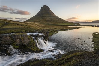 Sunrise on Kirkjufell mountain with waterfall Kirkjufellfoss