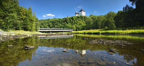 Castle Burgk Castle and covered wooden bridge on the river Saale