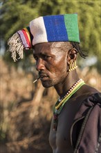 Man with colorful headgear