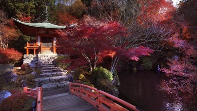 Bridge leading to Bentendo Hall over a pond with Zen garden at Daigo-ji temple