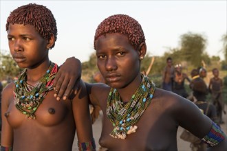 Two girls with necklaces