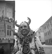 Man with mask on a parade