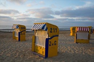 Yellow beach chairs during off-season