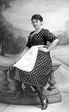 Woman posing with apron