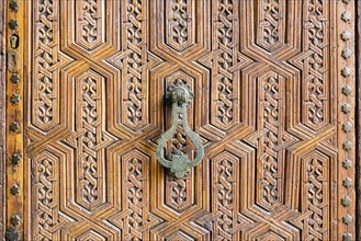 Carved wooden door at Marrakech Museum