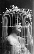 Woman in a birdcage