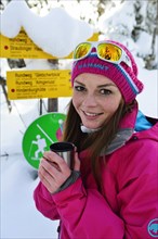 Woman in winter with tea