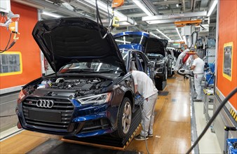 Installation of the front seats on the assembly line of the Audi A3 at the Audi AG plant in Ingolstadt