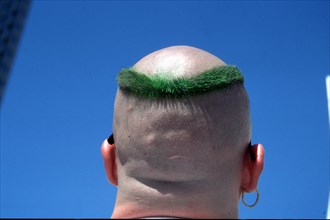 Bald man with green hair
