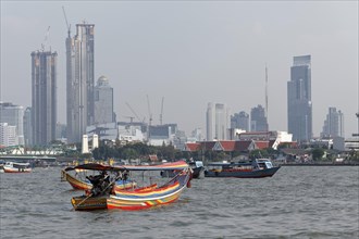 Longtail boats on the Mae Nam Chao Phraya River