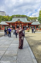 Tourists in front of Ikuta Shrine
