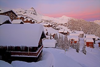 Village view snow-covered against Bettmerhorn 2872m at dusk