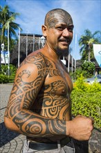 Man with traditional Marquesa tatoos