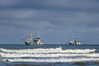 Shrimp cutter towing the nets off the coast