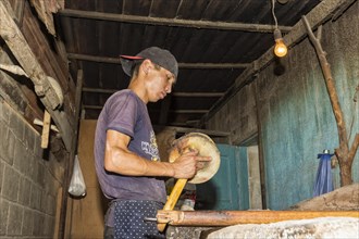 Kyrgyz man preparing the traditional Kyrgyz bread