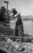 Man chopped wood with an axe