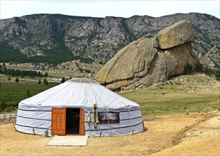 Yurt in front of the rock formation turtle