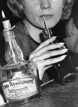 Woman drinking Coca Cola