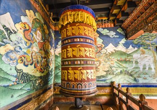 Prayer mill and mural painting in the monastery fortress