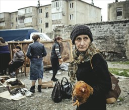 Woman with Chicken