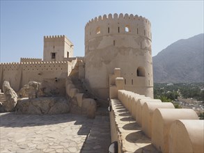 Fortress Nakhl with round tower and battlements